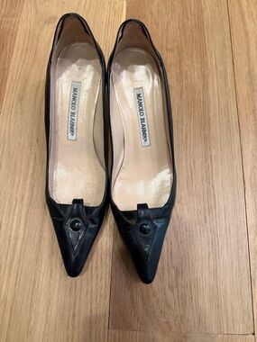 Manolo Blahnik Black Pointed-Toe Leather Pumps with Button Detail